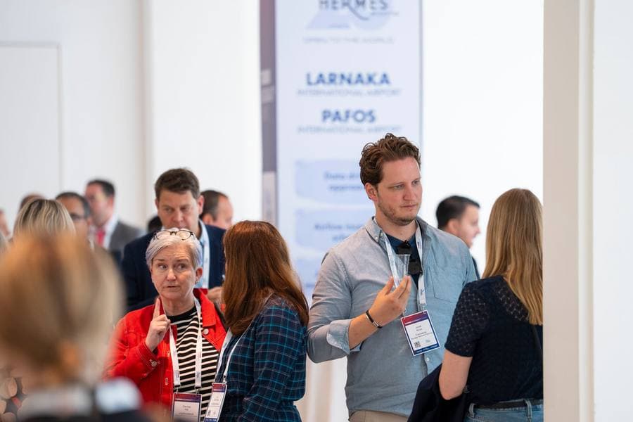 Delegates networking between sessions at the Rimini Summit